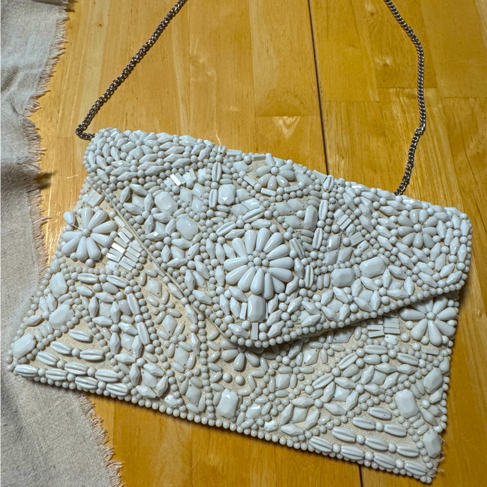 True Decadence beaded envelope clutch in ivory
